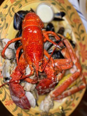 Large Clam Bake; steamed lobster, shrimp, clams, mussels and steamers in wine and garlic sauce.