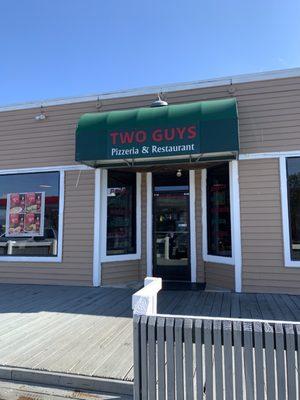 Restaurant front. Beside a gas station.