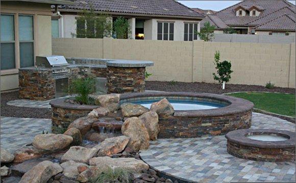 Spa, water feature and BBQ island