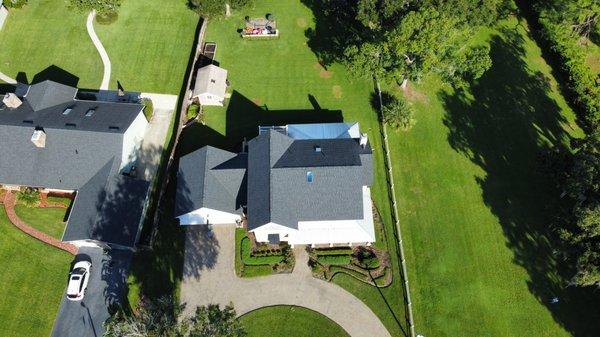 Lake County home with a mix of asphalt shingle and metal.