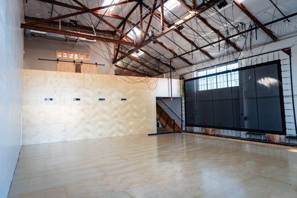 Studio West wood floor, trampoline wall, and ADA-accessible ramp