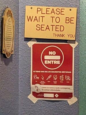 Please wait to be seated