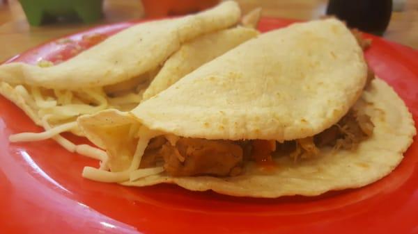 The tacos come on flour tortillas and are super huge.