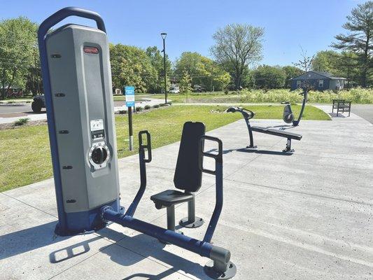 Exercise equipment by the playground