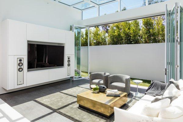 Family Room: Retro Modern home, located in Trousdale, California