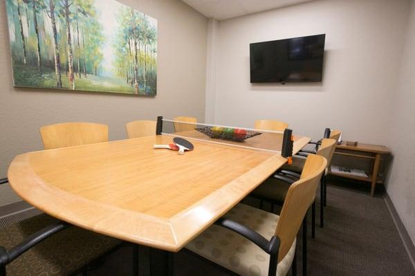 Large conference room. Seats 8 - 10. Flat screen TV. Available to rent by the hour or day. Doubles as a ping-pong table for stress relief ;)