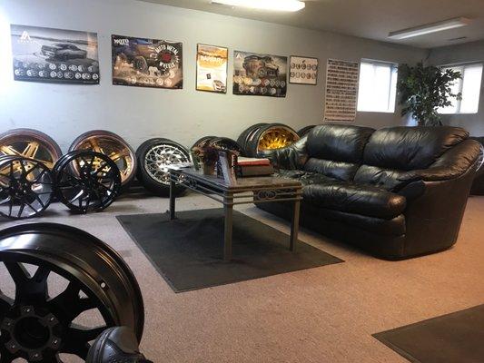 Rims, comfortable couch, Tv. Good place if you have to wait.