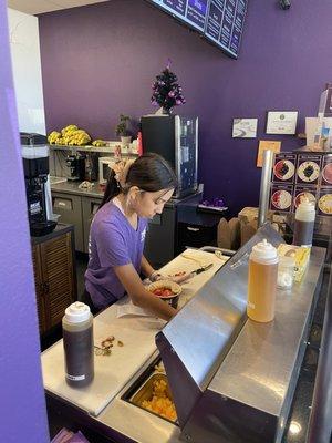 Making our açaí bowl