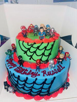 Fancy two-tier Marvel Spider-man ice cream cake made for a customer cake order.