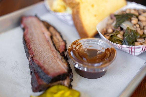 1/3lb Brisket Tray ($21) comes w/ two sides and a slice of bread