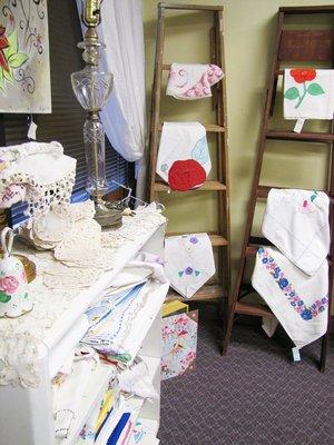 Handkerchiefs, doilies, vintage linens and more in our linen room upstairs.