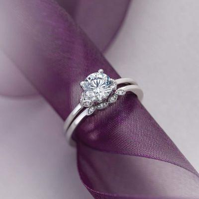 We specialize in creating an engagement ring and wedding bands that are unique to you and your love. www.enchantedjewelryct.com