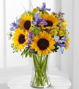 Sunny Day Flowers are great any day of the week.  Sun Flower Arrangement