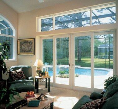 Four lite sliding patio door with transom.