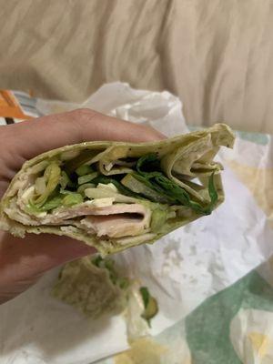 This is the size of half my wrap before my first bite. ARE YOU KIDDING ME