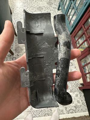 Parts left lying loose in dishwasher after "repair."