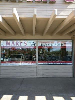 Mary's Hair Design exterior window view.