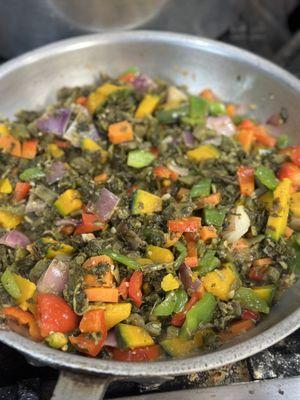 Veggie Delight ( Made with fresh Calaloo, onions, sweet peppers and pumpkin)