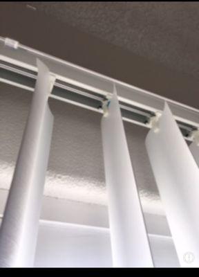 Vertical blind slat that was fixed for $97.00. Notice the tape.