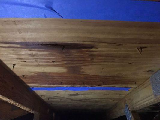 Attic inspection damaged sheathing from roof leak