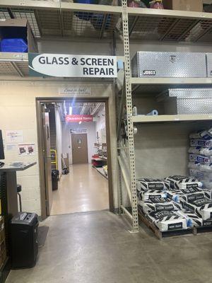 Back of store - entry to glass repair shop