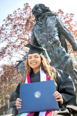 Recent graduate photographed on Marquette's campus.