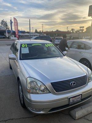 The car at the dealership.