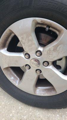 See all the NEW brake dust from brand new ceramic pads on Brand new rotors? This is how they work, had greasy hand prints all over the car