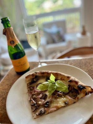 Truffle pizza with French bubbly. A match made in heaven. The crust!!! Oh the perfect crust!!! Swoon!!!