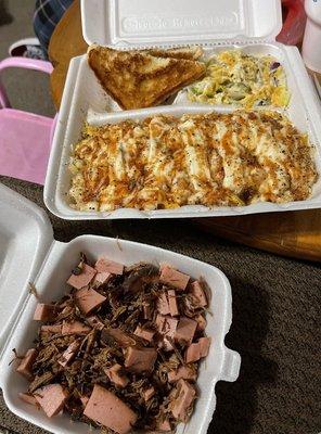 This was a potato with salad and toast. I asked for my brisket and bologna on the side. The meat usually just comes on top.