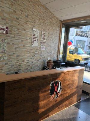 Barber and Beauty School in Queens NY. Sylvia is greeting patrons and students!