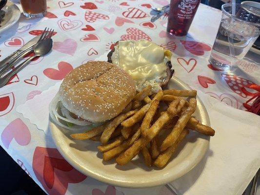 Tripod cheeseburger with a fried egg