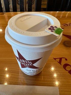 Coffee cup with mouth sticker