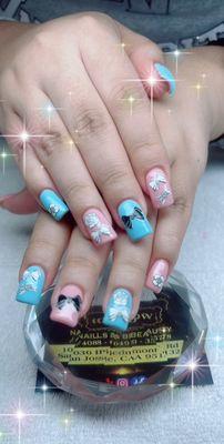 Fullest acrylics nails with butterfly designs. Nails done by Tracy