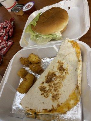 Burger with two sides (cheese curds and quesadilla)