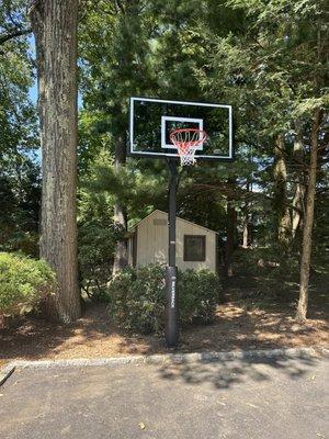 In-ground basketball hoop installation