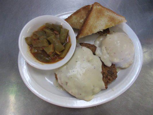 Chicken Fried Steak with mashed potatoes and veggie of the day