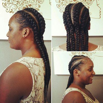 Client received a shampoo, blow-dry and invisible cornrow extensions.