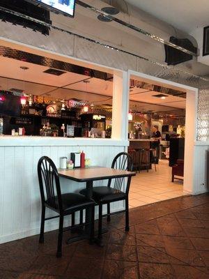 Seating area looking toward bar