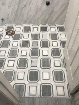 Leathered marble flooring.