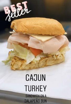 Cajun turkey sandwich on jalapeño bun