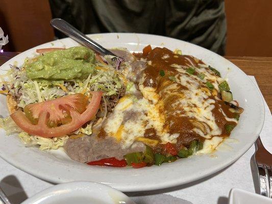 Shredded beef tostada and veggie and cheese enchilada.