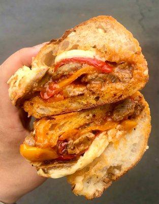 Italian Ribeye Panini - ribeye with cheddar, caramelized onions, fried peppers & red pepper chilli pesto.