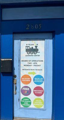 Steam On Learning Center Front door Sign