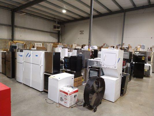 The selection of larger appliances toward the back of the store.