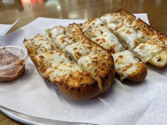 9. Garlic Bread with Cheese and a side of Seniore Sauce