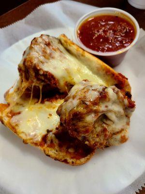 Photos don't do this sandwhich justice; this is just half of my large and flavor packed meatball sub - yummm!