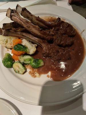 Rack Of Lamb Roasted To Your Specifications And Served With A Rich Burgundy Demi - glace