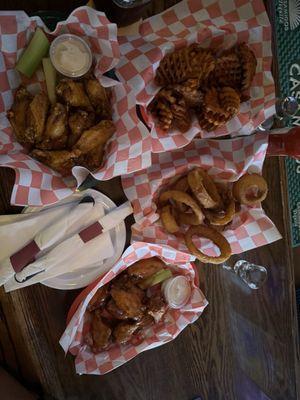 Wings, onion rings, sweet potato fries