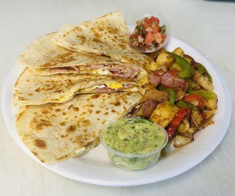 Breakfast quesadilla, meat choice: ham, bacon, sausage or chorizo.